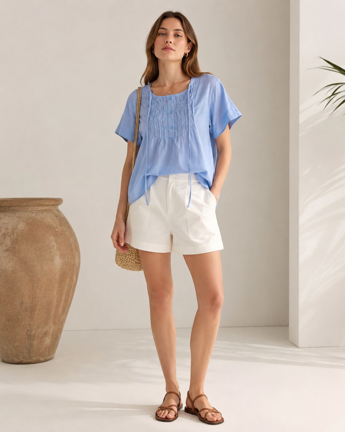Blue short-sleeve button-front blouse