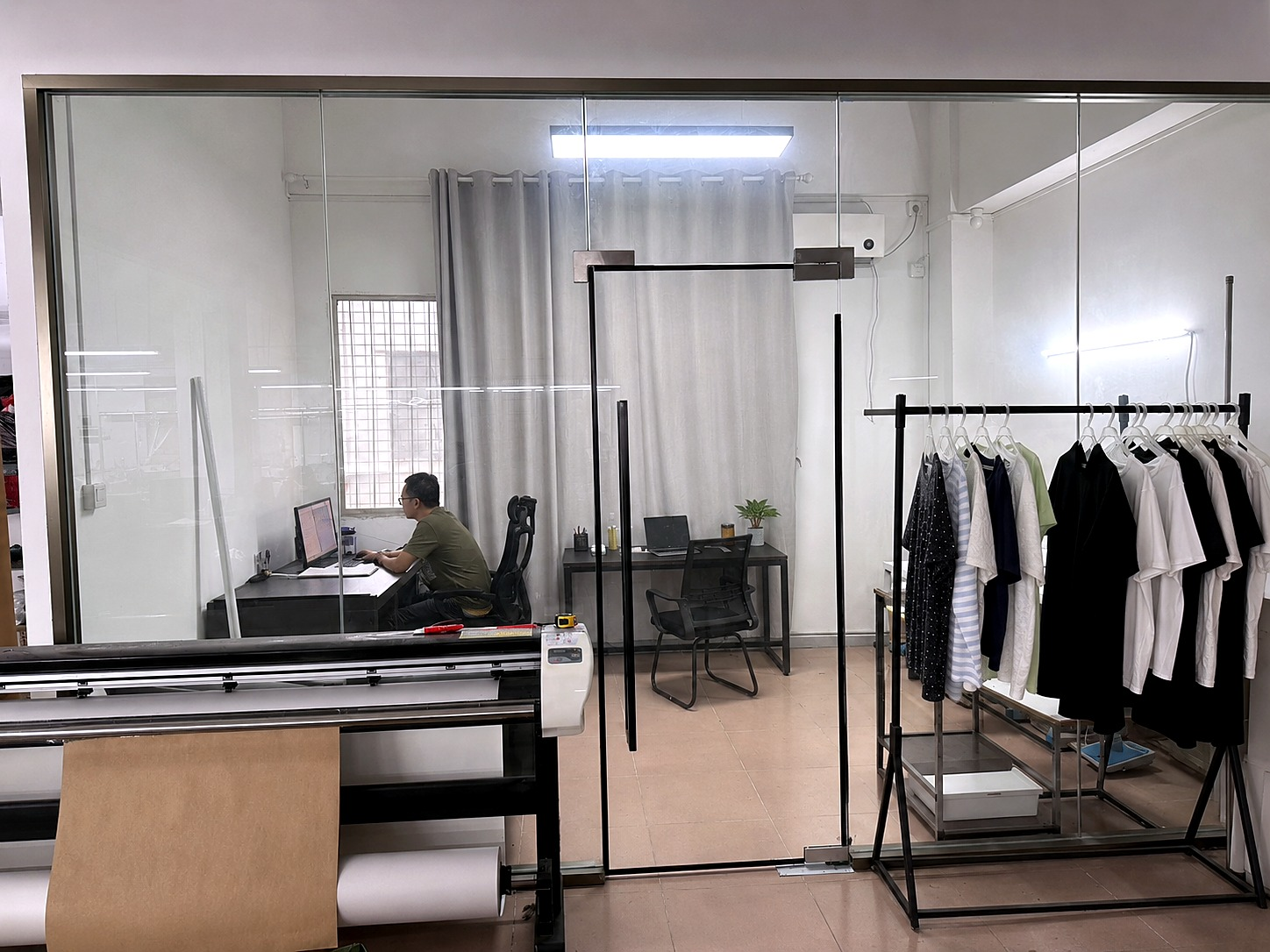 Sample development room with pattern equipment and garment samples